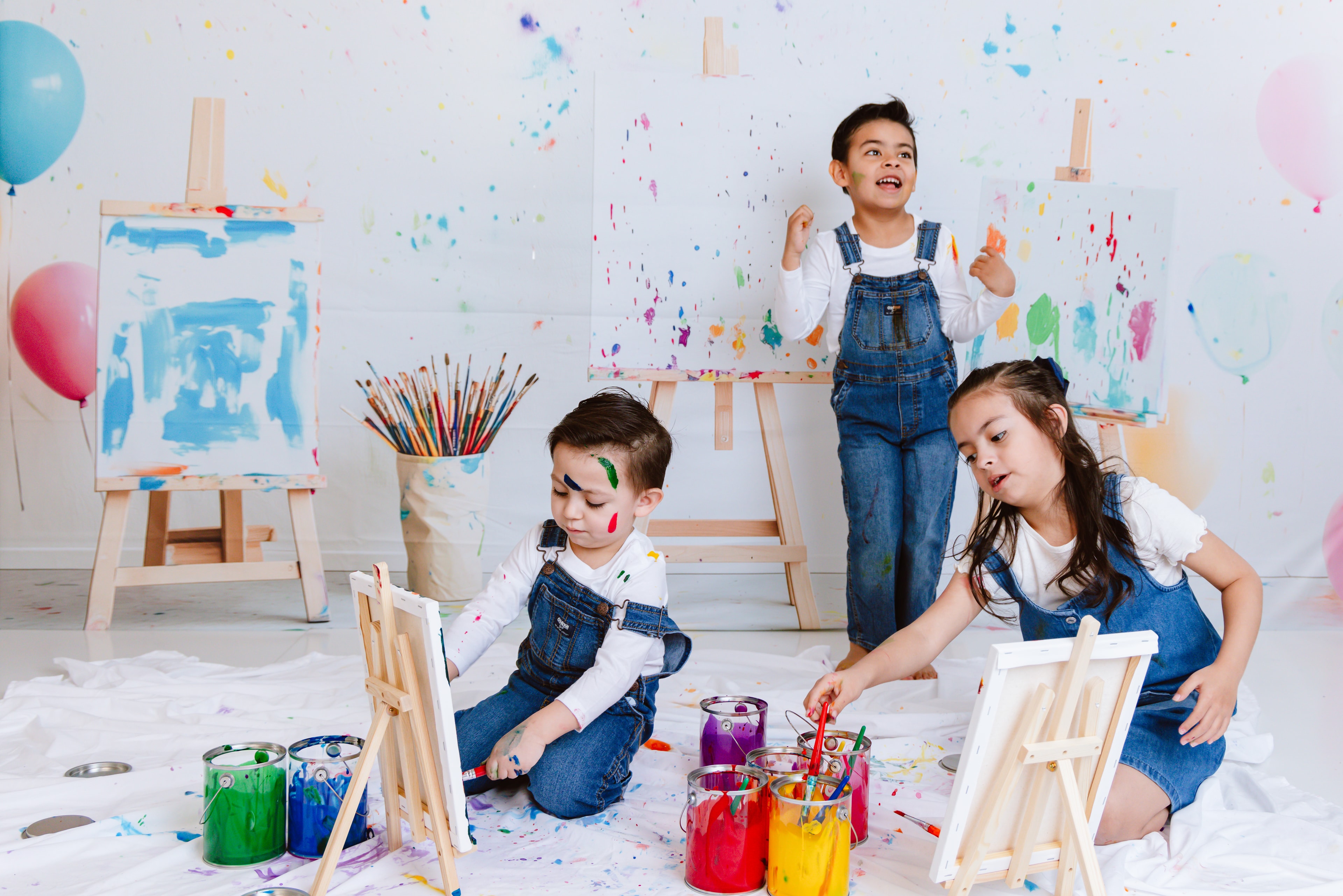 Children painting and creating together — the inspiration behind KUNKU